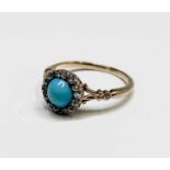 A Victorian gold turquoise and diamond cluster ring 2.7gmCondition report: No chips to the