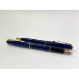 A Parker Sonnet deep blue fountain pen with gold medium nib date code IIE empty cartridge and