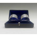 A pair of boxed 'Lawson & Co' bright cut Scottish serviette rings.Glasgow 1908.
