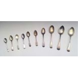 Ten silver spoons 11oz.