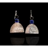 A pair of Breon O'Casey silver and stone earrings, each has a trio of lapis discs over an axe-