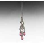 An 18ct white gold pendant and chain set with diamonds and faceted pink tourmaline drops Height 46mm