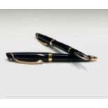 A Sheaffer Valor black fountain pen with gold trim and 14ct gold nib together with a matching