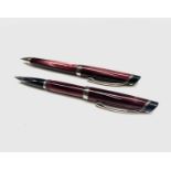 A Sheaffer Valor burgundy fountain pen with paladium trim and 14ct gold nib together with a matching