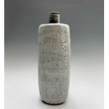 Bill MARSHALL (1923-1997) An impressive hammered stoneware bottle vase of rounded triangular section