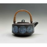TROIKA POTTERY (1963-1983)Teapot with swing cane handleStonewareHeight 19cmCondition report: