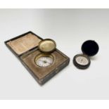 A small pocket compass, mid 19th century, with floating dial and original card case, with black