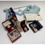 Three Masonic silver and enamel jewels, another silver medal, various others including some Cornish,