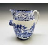 A Brameld large pearlware blue and white footbath jug, circa 1820, transfer printed with the "Boys