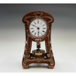 A good Jugendstil German mantel torsion clock, circa 1910, the mahogany case with applied Art