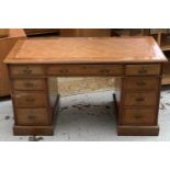 A Victorian walnut pedestal desk with an arrangement of nine drawers. Height 69.5cm, width 126cm,