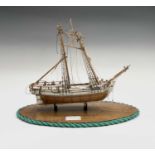 A 19th century Prisoner of War style bone and hardwood model of the ship 'Sultana', possibly