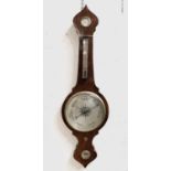 A Victorian rosewood wheel barometer, with silvered dial, height 103cm.