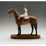 A Beswick sculpture of a racehorse and jockey, 'Arkle - Pat Taaffe Up', matt, model no. 2084, on