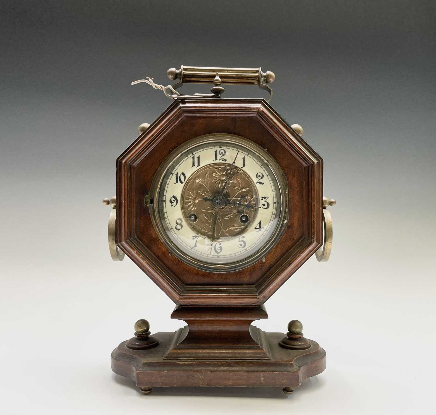 A German walnut and brass mantel clock, circa 1900, in the Aesthetic taste, with octagonal case