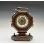 A German walnut and brass mantel clock, circa 1900, in the Aesthetic taste, with octagonal case
