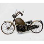 A scrap metal model of a motorcycle, welded construction, the dummy petrol tank initialled RB,