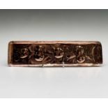 A Newlyn copper rectangular pen tray, repousse decorated with medlars on a matted ground, stamped