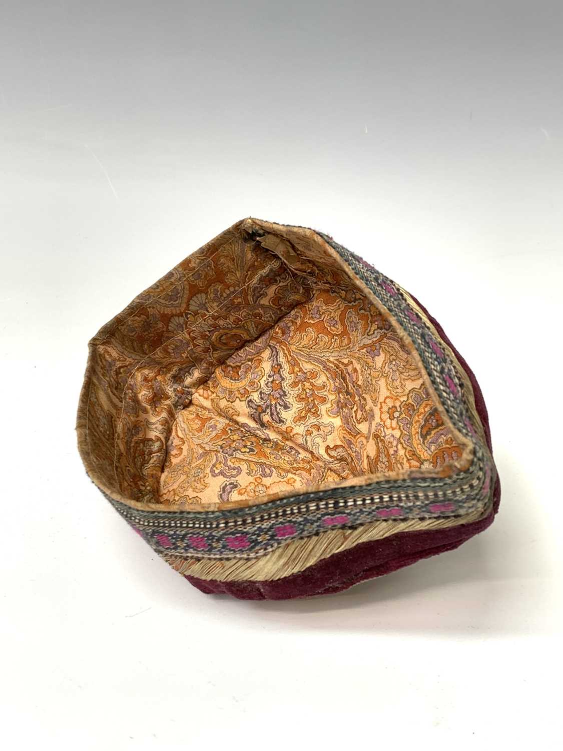 Three eastern skull caps, circa 1920, each embroidered and with gold thread decoration, together a - Image 6 of 13