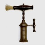 A 19th century brass barrel corkscrew, the rosewood handle with bottle, brush and rack and pinion