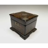 A Victorian papier mache rectangular tea caddy, with a burrwood finish and pierced brass mounts, the