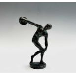 A small bronze figure of an athlete throwing a discus, after the antique, height 10cm.