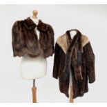 A Dominion Fur Co. Limited brown astrakhan coat with blonde mink collar and bracelet length sleeves,