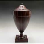 A George III mahogany cutlery urn, with chequer strung banding, turned finial and square base,