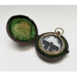 A late Victorian gilt compass, by Negretti & Zambra, with mother of pearl dial, cased, diameter 6.