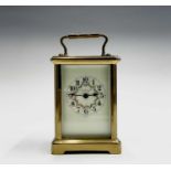 A French brass cased carriage timepiece, circa 1900, retailed by Black, Starr & Frost, New York, the