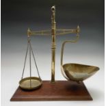 A set of 19th century brass scales by J.R. Wilson, with removable pan, on mahogany base.Height 56cm,