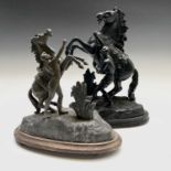 A French painted spelter Marly horse, late 19th century, height 42cm, together with a similar