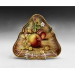 A Royal Worcester fruit painted small triangular shaped dish, signed D. Winter, late 20th century,