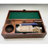 A Townson & Mercer Calorimeter or fuel tester, contained in a fitted mahogany box and with glass