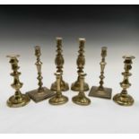 An unusual pair of Victorian brass candlesticks with adjustable internal candleholders, height 23cm,