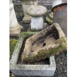 A miniature composite stone staddle stone on an associated square base, height 37cm, together with