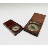 A mid 19th century mahogany cased travel pocket compass, with printed card dial and brass bezel,