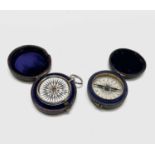 A late 19th century brass circular pocket compass, contained in original velvet lined morocco