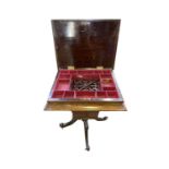 A Victorian rosewood work table, the hinged lid opening to reveal a fitted interior, height 71cm,