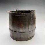 An oak metal bound pail, circa 1900, with iron swing handle, height 30cm, diameter of base 32cm.