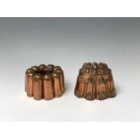 Two Victorian copper jelly moulds, height 13, width 15.5cm, depth 10cm, also height 9cm, diameter