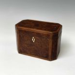 An inlaid burr walnut tea caddy, early 19th century, height 12.5cm, width 18.5cm, depth 10.5cm.