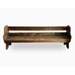 A beech hall bench, circa 1900, height 82cm, width 230cm, depth 41.5cm.