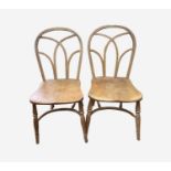 A pair of Gothic elm chairs, late 19th/early 20th century, height 88cm, width 40cm.Condition report: