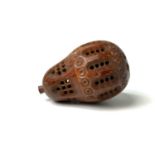 A 19th Century carved coquilla nut pomander, height 6.5cm, width 4cm. Provenance:Michael