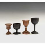 Four Victorian treen goblets, heights 12, 10, 7.5 and 7.5cm. Provenance:Michael Trethewey. A