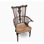 A Late 18th Century Thames Valley Fruitwood Armchair, the comb shaped top rail above a solid vase