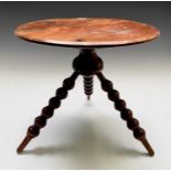 A yew wood gypsy table, 19th century, the circular top on three bobbin turned legs, height 42.5cm,