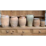 A group of six terracotta storage jars, various sizes, the largest height 38cm (6).