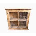 A Victorian pine hanging wall cabinet, height 70cm, width 69cm, depth 28cm.Condition report: one